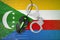 Comoros flag and handcuffed computer mouse. Combating computer crime, hackers and piracy