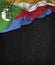 Comoros Flag Vintage on a Grunge Black Chalkboard With Space For