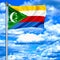 Comoros waving flag against blue sky