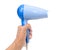 Compact blue hairdryer in hand