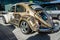 Compact car Volkswagen Beetle in unusual body painting aerography.