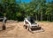 Compact front end loader on the dirt of an empty building lot