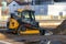 Compact track loader JCB 300T on a construction place. Tracked construction equipment on a construction site. Russia