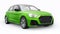 Compact urban premium car in a green hatchback on a white isolated background. 3d illustration