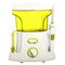 Compact yellow Oral irrigator of the oral cavity intended for washing the garbage and soft dental patch from the