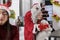 Company director dressed as Santa Claus