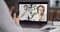 Company members having video chat on laptop at home