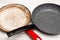 Comparison of pans. Old and new frying pan. New and old damaged non-stick coating