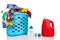 Comparison of regular and concentrated laundry liquid detergent next to basket full of clothes