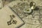 Compass, antique keys and notebook on blur vintage world map, journey concept, copy space