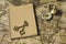 Compass, antique keys and notebook on blur vintage world map, journey concept, copy space