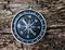 compass on a background of wood arrows magnetic field hike scout