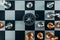 compass and chess piece on chess board game for ideas, challenge, leadership, strategy, business, success or abstract