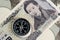 Compass on Japanese Yen banknotes money using as Japan economic problem solving, financial direction or key to get success in