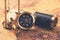 Compass and nautical vintage equipment on old world map