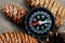 Compass and pine cones so close, top view