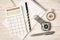 Compass, pocket watch, calculator, notepad, ruler, pen and pencil - retro scene