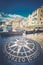 Compass rose. Windrose mosaic on the road in Camogli, Italian city