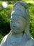 Compassion: smiling Kuan Yin with sunbeam