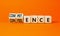 Competence and confidence symbol. Concept word Competence Confidence on wooden cubes. Beautiful orange table orange background.