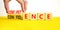 Competence and confidence symbol. Concept word Competence Confidence on wooden cubes. Businessman hand. Beautiful yellow table