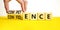 Competence and confidence symbol. Concept word Competence Confidence on wooden cubes. Businessman hand. Beautiful yellow table
