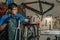 Competent bicycle mechanic in a workshop repairs a bike.