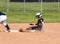 Competing in high school softball game