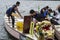 Competing teams of people embark on Sports Native Row Dragon head Boats during Dragon Cup Competition.