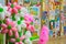 Competition of children`s drawings. Exhibition of children`s art. Colorful balloons in the foreground. Defocused background