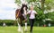 A competitor shows her horse at a show