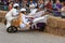 Competitors Crash Vehicle Into Hay Bales At Soap Box Derby