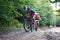 The competitors racing along the forest roads of the Tricity Landscape Park