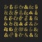 Complete different golden and isolated ampersand font faces icons set on black