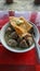 a complete plate of meatballs called bakso