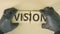 Completing jigsaw puzzle with VISION text