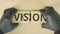 Completing jigsaw puzzle with VISION text