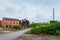 A complex of buildings after the former steelworks after renovation. Old halls in the background. ChorzÃ³w, Poland