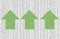 Complex data spreadsheet with green arrows indicating a postive business momentum and profit