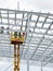 Complex large volume steel frame structure assembly using self propelled scissor lift platform