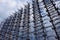 A complex structure of rusted metal and wires against a cloudy sky. Duga is a Soviet over-the-horizon radar station for an early