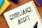 COMPLIANCE AUDIT question marks inscription on the piece of paper