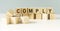 COMPLY word made with building blocks