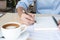 composing music note top view with hand writing coffee and blue