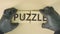 Composing two jigsaw puzzle pieces with jigsaw puzzle text