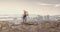 Composite of caucasian senior woman hiking on mountain, and modern cityscape