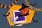 Composite creative 3d photo collage of arm demonstrate evil pumpkin head in wizard hat from monitor isolated on colorful