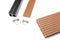 Composite decking board with mounting material