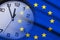 Composite of the EU flag and dial of a clock