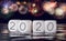 Composite of fireworks and calendar for 2020 New Year holiday background